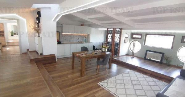 Apartament mansardabil de