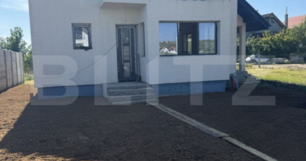 Casa P+M, exterior finisat, interior la gri, 500 mp teren, S