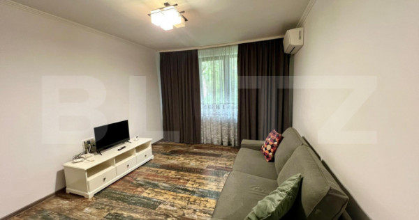Apartament cu 2 camere, parter, centrala si AC, zona central