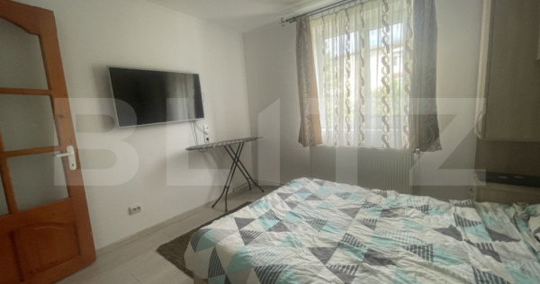 Apartament cu 2 dormitoare și loc de parcare, &icirc;ntr-o zonă