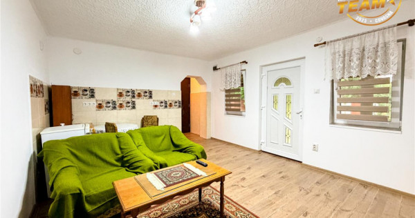 Casa cu teren generos de 1.315 mp, bucatarie de vara complet