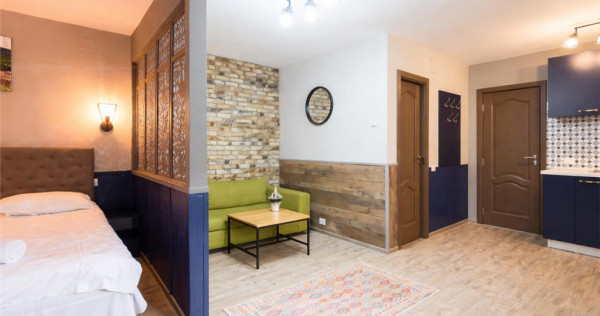 Apartament cu trei unitati locative, baie si bucatarie fieca