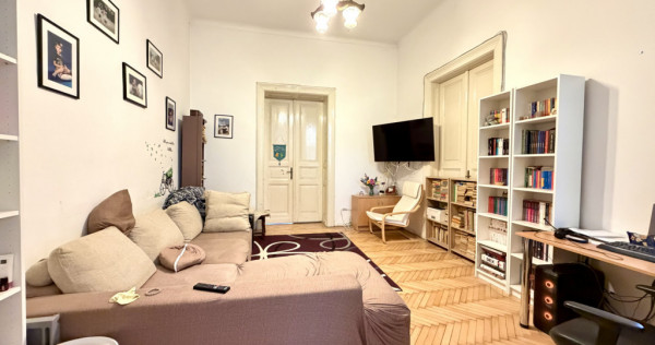 Casa cu 4 camere, 136 mp utili, curte comuna - Zona Centrala