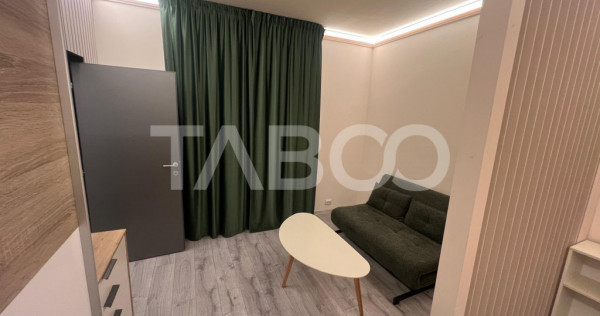 Garsoniera de inchiriat cu curte zona Centrala 2 parcari