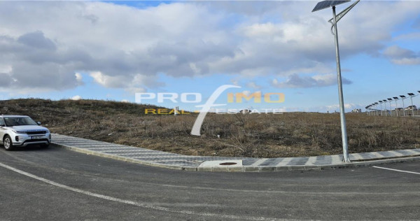 Teren 965mp.deschidere la 3 strazi, pe malul Lacului Techirg