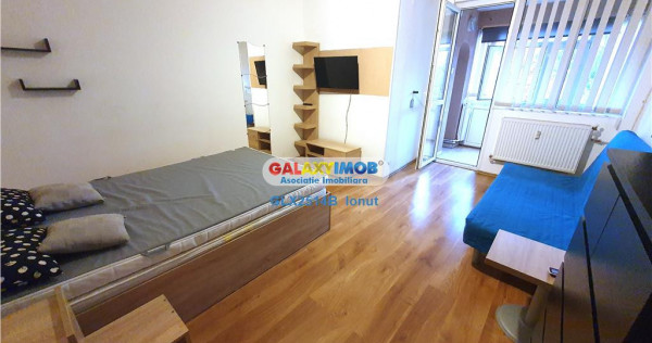 Garsoniera de Titan mobilata utilata