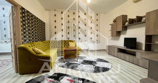 Apartament 2 camere,la casa,curte comuna,zona Dambovita