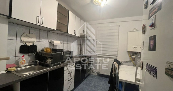 Apartament cu 2 camere, semidecomandat, etaj intermediar