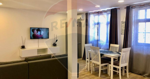 Apartament în zona Centrala, et.1, curte privata.