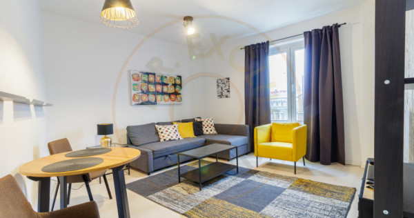 Apartament renovat complet, cu vedere spre ASE | Pta. Romana