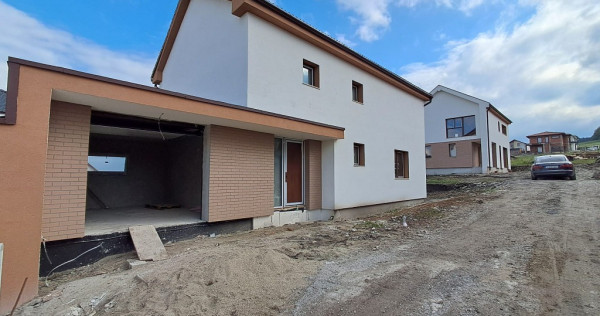 Casa cuplata prin garaj 23 mp, sup. totala 147 mp P+E in Chinteni