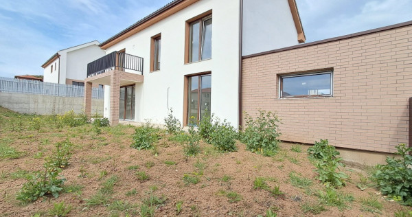 Casa cuplata prin garaj 23 mp, sup.totala 147 mp,teren 400 mp Chinteni