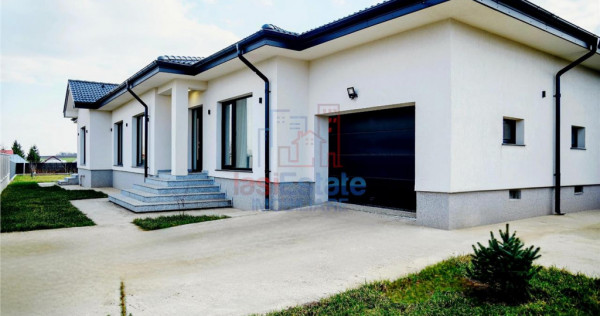 Casa intr-o zona linistita cu garaj si teren-1091 mp