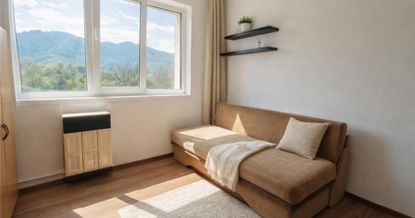 Garsoniera luminoasa cu bucatarie utilata si baie cu cada