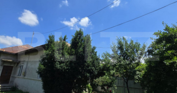 Casă 65 mp, teren de 1.500 mp, zona Titu