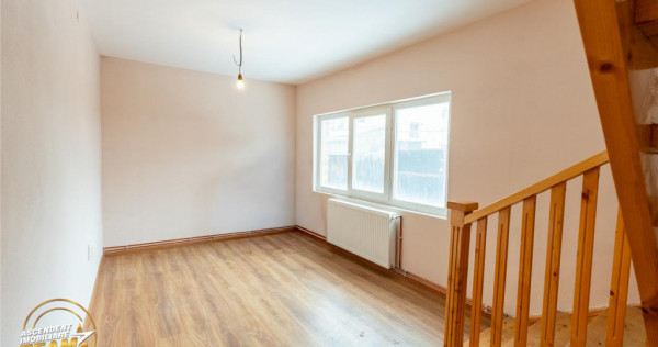 Accesibilitate si farmecul unei case cu garaj, locatie de re