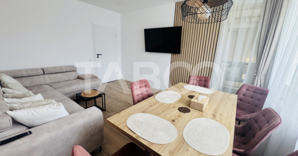 Apartament modern 63mpu 3 camere 2 bai 2 parcari de vanzare