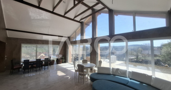 Casa de vanzare 405 mp utili 2 garaje 250 mp terase Slimnic